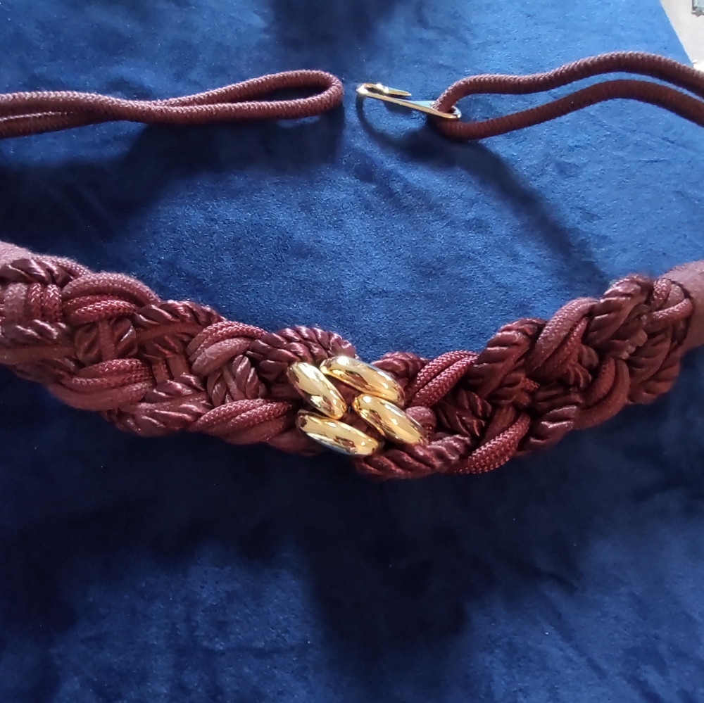 Belt, burgundy/purpleish wine color. 31" long.